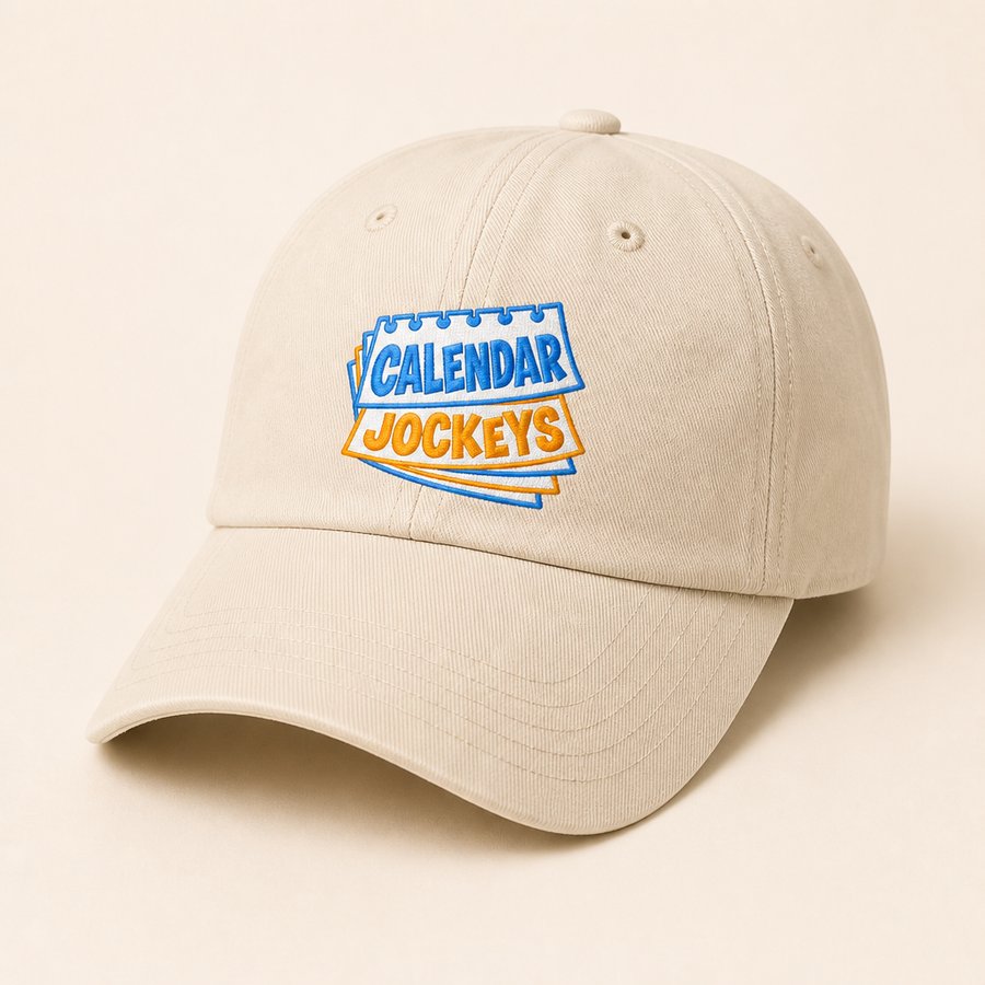 Cream dad cap with the Calendar Jockeys logo embroidered on the front
