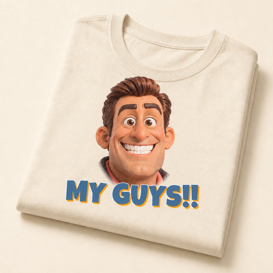 Cream t-shirt printed with Trent&rsquo;s grinning face above the words MY GUYS!! in blue with an orange shadow